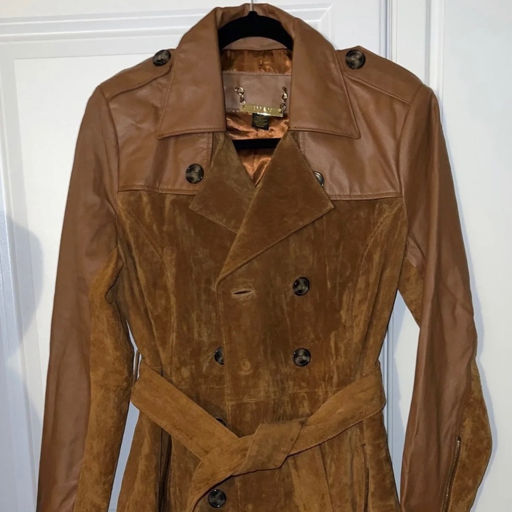 Beautiful new Iman Trench coat. Never worn only tried on.